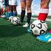 Skyline's girls soccer team huddles around their head coach Chris Morgan during practice, Wednesday May 22.Courtney Sacco I AnnArbor.com     