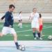 Head Coach Chris Morgan kicks the ball during practice Wednesday May 22.Courtney Sacco I AnnArbor.com     