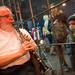 Alex Phibbs looks in as the Davie Sharp quartet plays to the shoppers in Kerrytown during this years Midnight Madness in Ann Arbor.
Courtney Sacco I AnnArbor.com   
