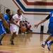 The Flyers DaQuanta Brown dribbles the ball down court during Friday nights game against Lincoln High School.
Courtney Sacco I AnnArbor.com 