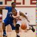 The Flyers Jaleel Neal drives the ball down court against Lincoln's Javin Etchison during Friday nights game at Willow Run High School.
Courtney Sacco I AnnArbor.com 