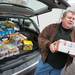 Warren Hughes helps unload canned goods to be donated to the 2012 Rockin' for the Hungry Food Drive. Courtney Sacco I AnnArbor.com  