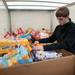 Jakob helps load a moving pod full of donated food for Rockin for the Hungry.
Courtney Sacco I AnnArbor.com  