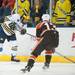 The Wolverines Lee Moffie shoots the puck against the Falcons, Tuesday Jan. 8.
Courtney Sacco I AnnArbor.com  