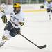 The Wolverines left wing Phil Di Giuseppe skates the puck down the ice against the Falcons during the third period, Tuesday Jan. 8

Courtney Sacco I AnnArbor.com   