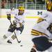 The Wolverines defenseman Jon Merrill skates the puck down the ice against the Falcons, Tuesday Jan. 8.
Courtney Sacco I AnnArbor.com  