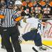 The Falcons Bobby Shea punches the Wolverines Jacob Trouba, Tuesday Jan. 8.
Courtney Sacco I AnnArbor.com  