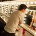 Looking in the mirror, Huron High School student Matt Egeler puts on his makeup as he prepares for the dress rehearsal of  "The Musical Comedy Murders of 1940."
Courtney Sacco I AnnArbor.com  