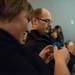Meredith Nickersln looks at an example during Michael Senkow's presentation on 3D printing at Nerd Nite.
Courtney Sacco I AnnArbor.con   