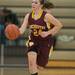 Manchester's Taylor Manders drives the ball down court.
Courtney Sacco I AnnArbor.com 