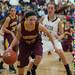 Manchester's Kathryn Pusano makes a rebound against Dexter during Tuesday nights in Dexter.
Courtney Sacco I AnnArbor.com 