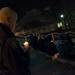Robert Heighes Eastern Michigan University Police Chief holds a candle during a vigil held in memory of Julia Niswender at Big Bob's Lake house at Eastern Michigan University Friday night.
Courtney Sacco I AnnArbor.com 
