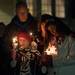 Julia Niswender's parents Jim and Kim Turnquist and sisters Jennifer, Madison Turnquist remember her during a vigil held in her honor at EMU's Big Bob's Lake house Friday evening.
Courtney Sacco I AnnArbor.com 