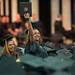 An undergraduate holds up her diploma after receiving it during EMU's 2012 winter commencement.
Courtney Sacco I AnnArbor.com  