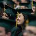 An undergraduate smiles, having just received her diploma during EMU's 2012 winter commencement.
Courtney Sacco I AnnArbor.com  