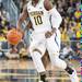 Wolverines junior Tim Hardaway Jr. drives the ball down court during the sound half of Thursday night game against EMU.Courtney Sacco I AnnArbor.com 