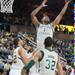 Eastern's Da'Shonte Riley makes a rebound against the Wolverines during Thursday nights game.Courtney Sacco I AnnArbor.com  