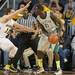 Wolverines freshman Nik Stauskas defensively plays against Eastern Michigan's Glenn Bryant during Thursday Nights game.Courtney Sacco I AnnArbor.com 