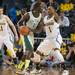Wolverines freshman Glenn Robinson III defensively plays against Eastern Michigan's Glenn Bryant during Thursday Nights game.Courtney Sacco I AnnArbor.com 