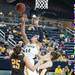 Wolverines Rachel Sheffer shoots a basket against Valparaiso during thursday nights game.
Courtney Sacco I AnnArbor.com 