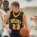  Chelsea's Luke Hollandsworth tries to maneuver around several Huron players during Friday nights game.
Courtney Sacco I AnnArbor.com 