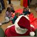Kids ate pizza and cookies with Santa before he handed out toys Saturday afternoon at Dress For Success Michigan in Ypsilanti. 
Courtney Sacco I AnnArbor.com 
