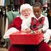 Prince Jerald tears into a wrapped Christmas present.
Courtney Sacco I AnnArbor.com 