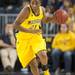Wolverines Nya Jordan dribbles the ball down court during the first half of their game against the Lady Lions Monday, Jan. 21.

Courtney Sacco I AnnArbor.com 