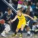 Wolverines Madison Ristovski grading Lady Lions Alex Bentley during the first half of their game Monday, Jan. 21.

Courtney Sacco I AnnArbor.com  