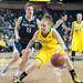 Wolverines Madison Ristovski  tries to move past her guard Lady Lions Maggie Lucas during the first half of their game Monday, Jan. 21.

Courtney Sacco I AnnArbor.com  