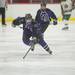 Pioneer's Brice Brown skates the puck down the ice during the first period of their game against Huron Saturday, Jan. 19.Courtney Sacco I AnnArbor.com  