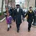 Guest speaker Dr. Eric Tremayne Mayes marches down South Main street in Ann Arbor as he takes part in the MLK Day Unity Walk Sunday, Jan 13.
Courtney Sacco I AnnArbor.com 