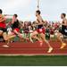 A group of runners on their second lap of the Saline High School track as they try to beat the recored for the fastest mile run in Michigan, Sunday, August, 4.
Courtney Sacco I AnnArbor.com 
