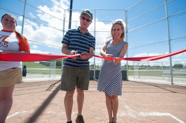 Ann Arbor Mayor John Hieftje and Julie Grand, chairwoman of the Ann Arbor's Park Advisory Commission, cut a ribbon during the ceremonial grand re-opening of Veterans Memorial Park, Sunday, August, 4.
Courtney Sacco I AnnArbor.com  