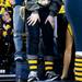 Michigan sophomore Shannon Maloney sits on the steps of Crisler Arena during the final minutes of play on Monday, April 8. Daniel Brenner I AnnArbor.com