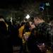 Michigan fans embrace after the 61-56 Final Four victory over Syracuse in the on the Diag on Saturday, April 6. Daniel Brenner I AnnArbor.com