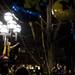 A Michigan fan climbed a light pole on the Diag on Saturday, April 6. Daniel Brenner I AnnArbor.com