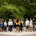 A group of people gather around a tour guide on Monday. Daniel Brenner I AnnArbor.com