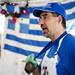 Ted Davlantes rings a bell around his neck while preparing traditional food during the Ya'ssoo Greek Festival on Friday, May 31. Daniel Brenner I AnnArbor.com