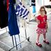 Maria Eva Foerster waves a Greek flag during the Ya'ssoo Greek Festival on Friday, May 31. Daniel Brenner I AnnArbor.com