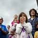 Ypsilanti resident Grace Corpodean, 5, applauds the Greek dancers while standing with her family during the Ya'ssoo Greek Festival on Friday, May 31. Daniel Brenner I AnnArbor.com