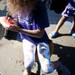 Plymouth resident Charlotte, 8, eats watermelon at Gallup Park on Sunday, July 14. Daniel Brenner I AnnArbor.com