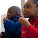 David, three, and Rebekah, five, Warren from the Willow Run school district eat before the National African American Parent Involvement Day at Lincoln High School on Tuesday, March 12. Daniel Brenner I AnnArbor.com