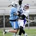 Pioneer junior Erik Barroso watches a loose ball after getting hit on Friday, April 12. AnnArbor.com I Daniel Brenner
