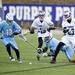 Skyline and Pioneer lacrosse players compete for a loose ball on Friday, April 12. AnnArbor.com I Daniel Brenner