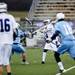 Pioneer senior Ryan Huffnagle shoots and scores in the game against Skyline on Friday, April 12. AnnArbor.com I Daniel Brenner