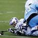 Pioneer senior Peter Burke eyes down a loose ball on Friday, April 12. AnnArbor.com I Daniel Brenner