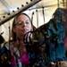Southgate resident Geri Prosniewski browses merchandise in a tent outside Crisler Arena during the Dance for Mother Earth Powwow on Saturday, April 6. Daniel Brenner I AnnArbor.com