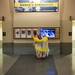 A young participant of Dance for Mother Earth Powwow uses a touchscreen television at Crisler Arena on Saturday, April 6. Daniel Brenner I AnnArbor.com