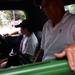 A young boy and his grandpa sit in the front seat of a 1937 Ford Pickup truck at the end of the Classic Car Show during the Chelsea Sounds and Sights on Friday, July 26. Daniel Brenner I AnnArbor.com